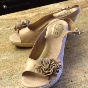 Brand new champagne wedge sling back shoe.